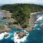 Caño Island can be seen from a distance, showcasing its pristine natural beauty