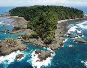 Caño Island can be seen from a distance, showcasing its pristine natural beauty